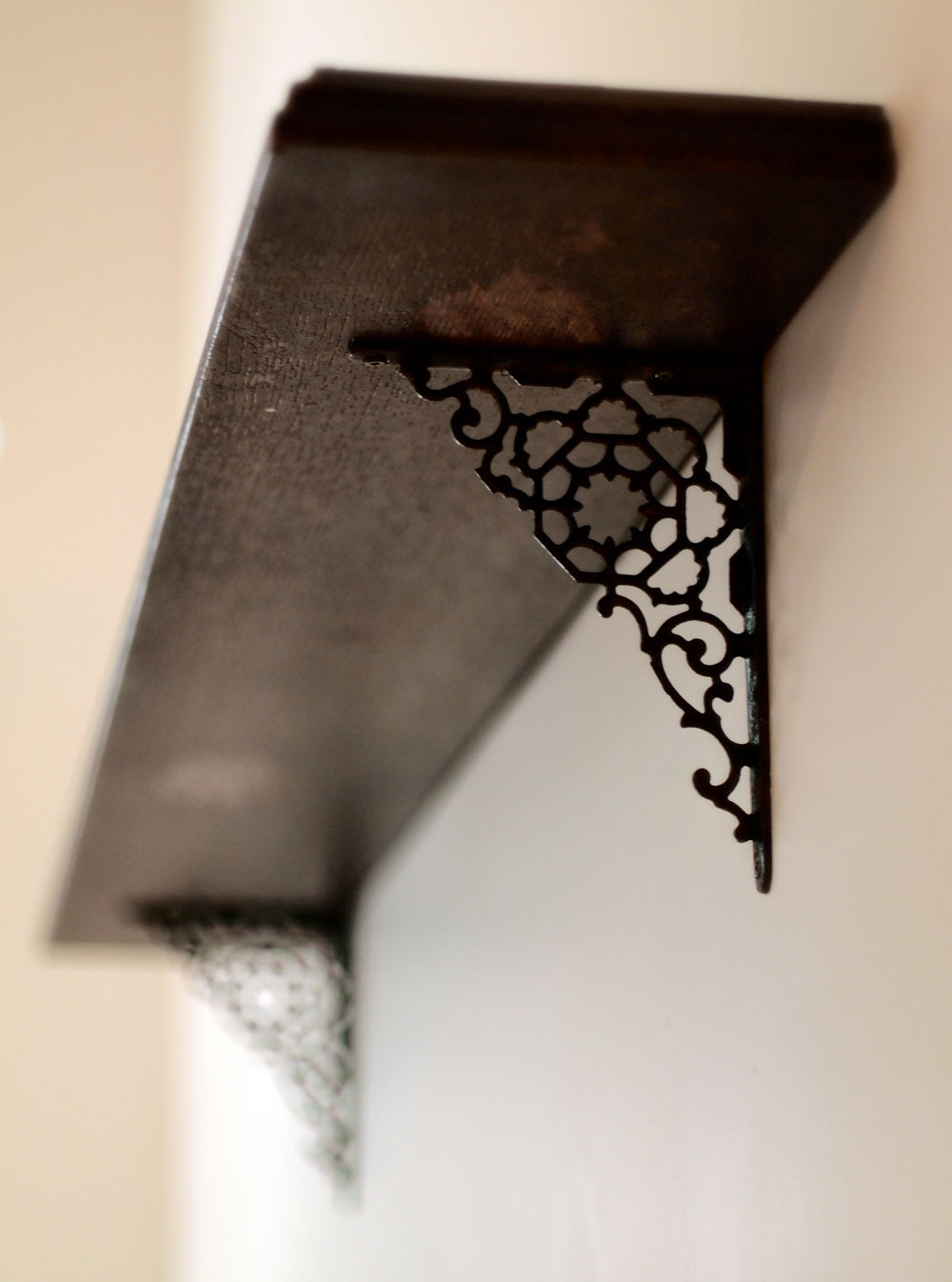 Victor Piano Shelf (detail of wall hangers)