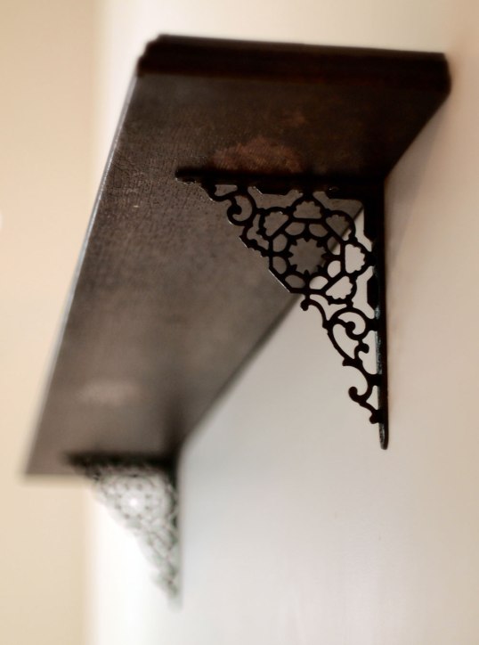 Victor Piano Shelf (detail of wall hangers)