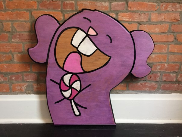 Purple Sister: Acrylic and marker on reclaimed oak laminate. 33