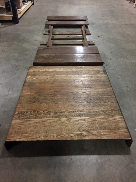 Disassembling a table from the late 1800s to be used as the main body of this sculpture.