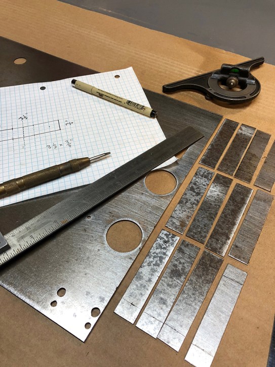 Hand-made brackets made from an access panel pulled from another piece of electronics work I made 12 years earlier.