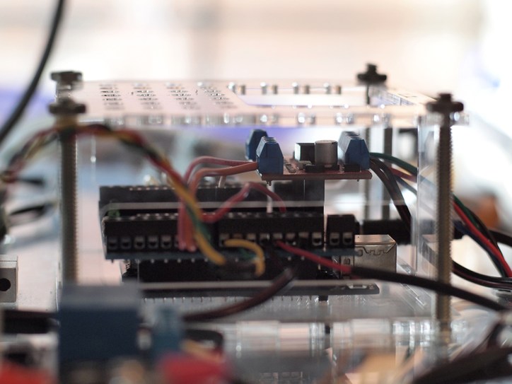 Side view of Arduino, Screwshield, & Big Easy Driver in a custom designed laser-cut enclosure.