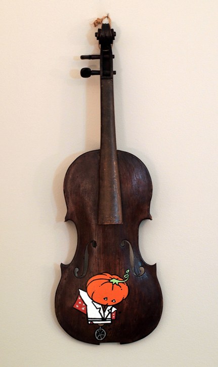 The Pumpkin's King: Acrylic and marker on vintage violin. 23” x 7 7/8” x 2 1/2”. 9.7.18