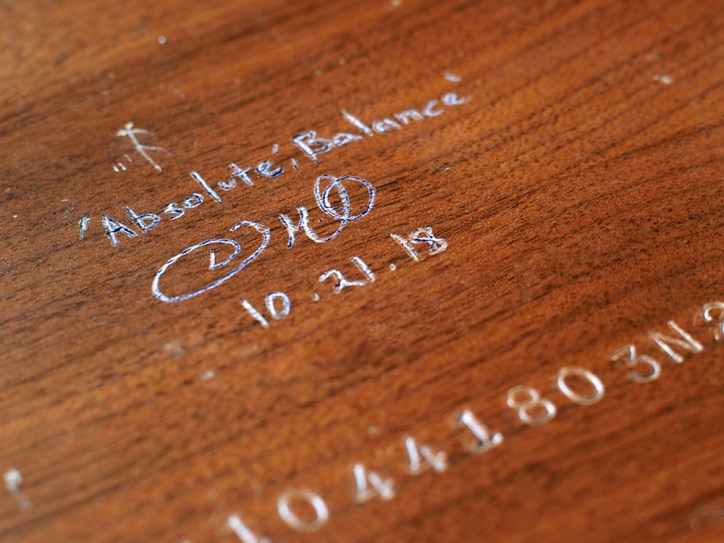 “Absolute: Balance”, back signature and title